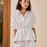 Astrid Linen Peplum Top in Off-white
